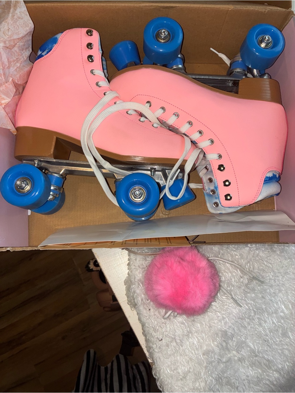 Pink Roller Skates with Blue Wheels